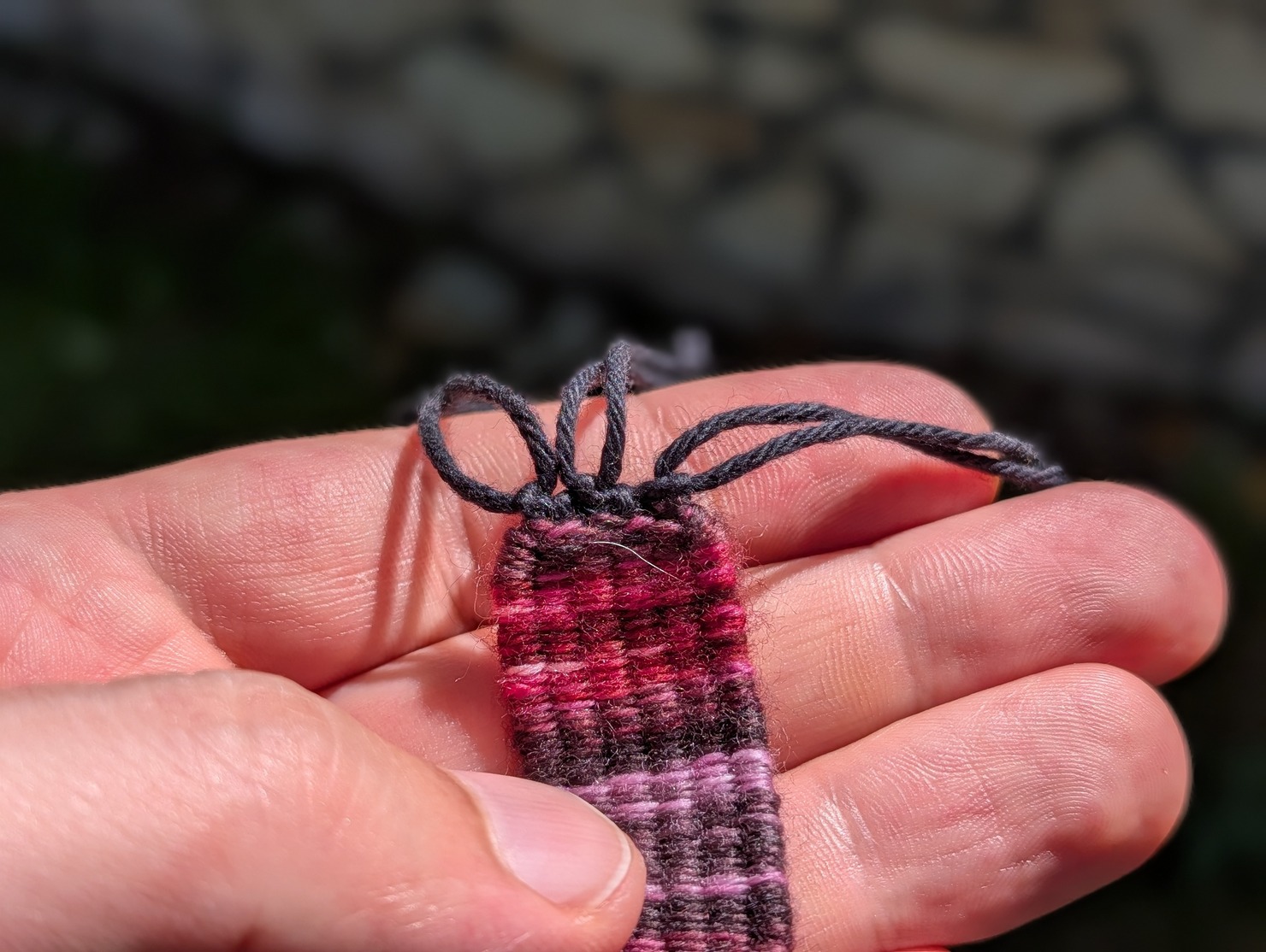 photo of the tied-off warp threads, ready to be trimmed